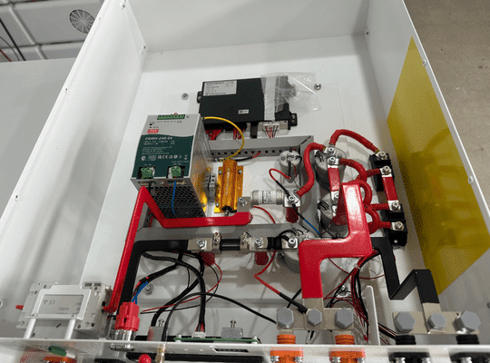 Rakour high voltage battery CAN and RS485 communication port connecting BCU to HV hybrid inverter BMS for real-time SOC and voltage monitoring in grid-tied battery storage systems